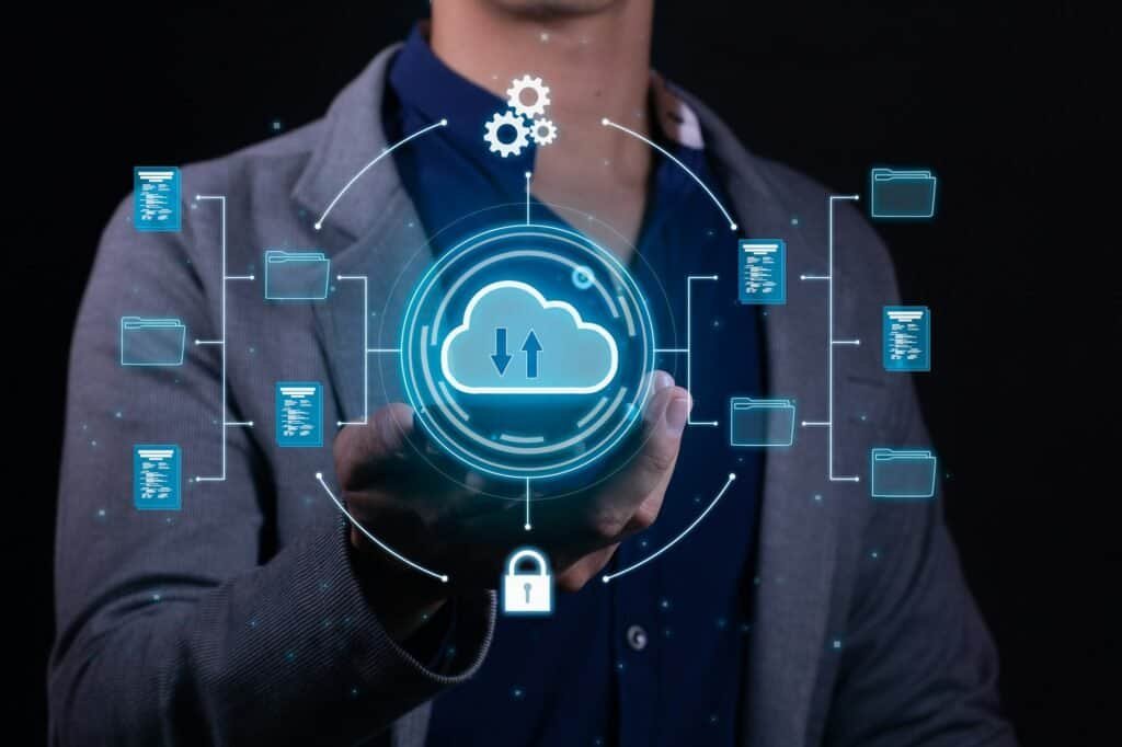 Welcome to the New Quantum Cloud Solutions Website! 2 A man employs cloud-based computing on his smartphone to facilitate data transmission and backup.
